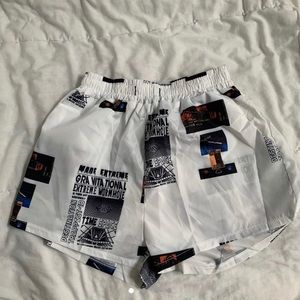 Newspaper print shorts